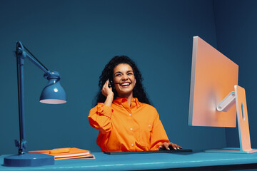 Support agent wearing headset and communicating with customer