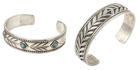 Silver cuff bracelets with tribal design and intricate patterns