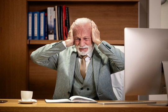 Senior general manager or businessman having problems at work.