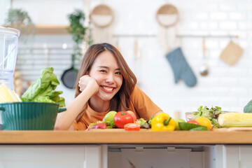 portrait smiling young woman having fun with food vegetables in the kitchen,healthy food,vitamin,health care,beauty,health