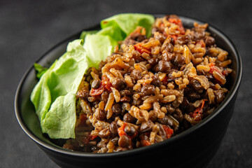 Rice lentil and vegetables snack fresh tasty food dish vegetarian vegan food no meat gourmet food background on the table rustic food top view copy space keto and paleo diet