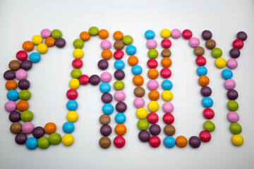 Word candy, colorful round treats
