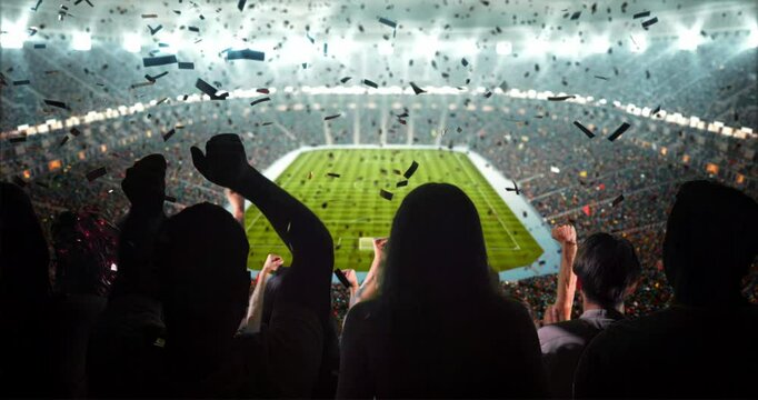 4K video of a lively stadium crowd at a nighttime soccer game, cheering with a large flag and confetti under bright lights