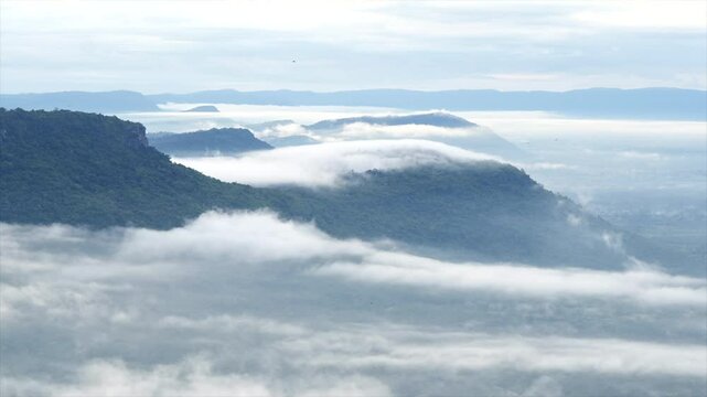 Time lapse time to see the beautiful sea of ​​mist in summer at Pha Mu E Daeng. Kantharalak District Sisaket Province Thai border area and the Cambodian border