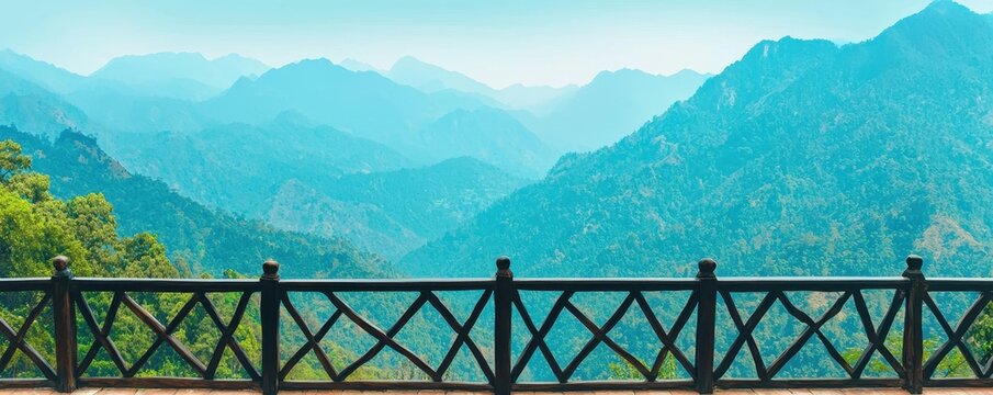 Panoramic Mountain View from Wooden Balcony Railing Scenic Landscape Photography