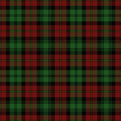 Red and green tartan plaid. Scottish pattern fabric swatch close-up.