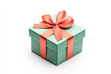 Obraz premium A beautifully wrapped mint green gift box with a coral ribbon, set against a clean white background