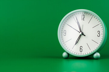 Clock tells the concept of working with valuable time, time management and time keeping.
