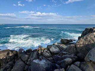 rocky coast and sunny sky