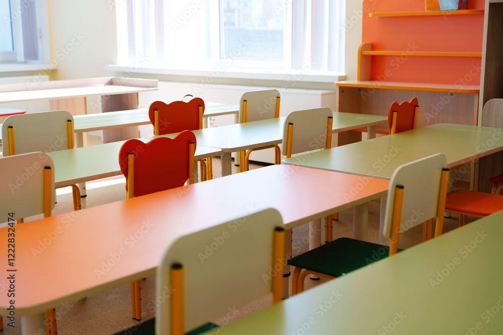 Poster bright and colorful classroom with neatly arranged tables and chairs in a learning environment desig