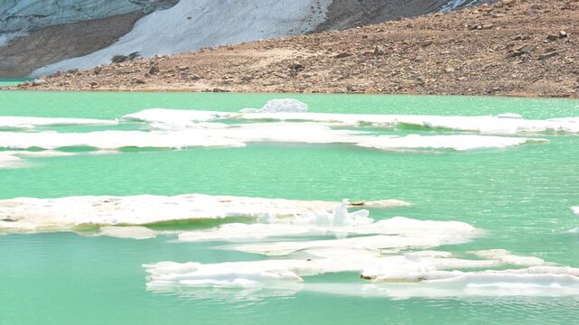 Edith Cavell Lake in Jasper National Park, surrounded by majestic mountains and glaciers