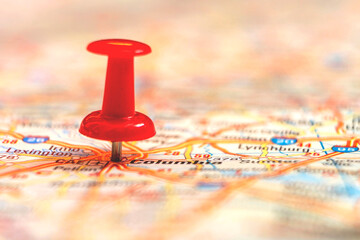 Map with stuck pins, close up