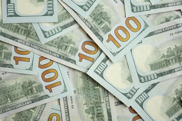 Big amount of american USD hunderd dollar bills banknotes close up