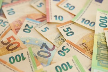 Pile of euro paper banknotes as finance background