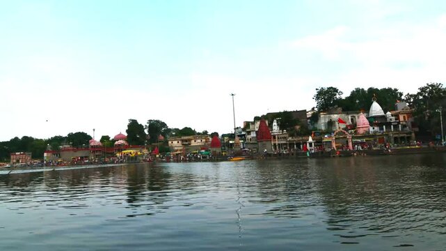 Timelapse of Ram Ghat Ujjain during evening. It is located on the bank of the river Shipra. The evening Kshipra aarti is one of the best attractions at Ram Ghat.