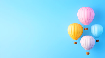 Obraz premium Colorful hot air balloons floating against a bright blue sky with a minimalistic design perfect for travel and adventure-themed backgrounds and creative designs. Selective focus
