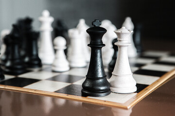Chess board game, business ideas and competition concept. Chess figures on a chessboard.