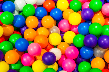 A vibrant display of multicolored balls in a playful dry pool.