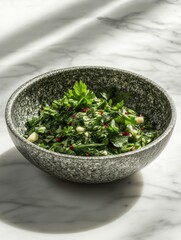 Greens and spices on marble