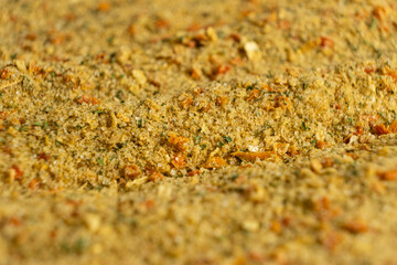 Natural seasoning with flavor enhancer, dried vegetables and salt