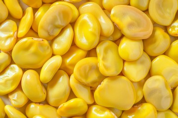 Fototapeta premium Big amount of yellow raw fava beans. Image illustrated food for advertisement