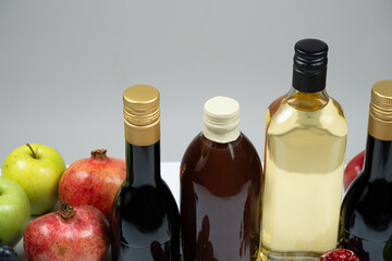 Different types of vinegar, Balsamic, pomegranate and apple vinegars in bottles