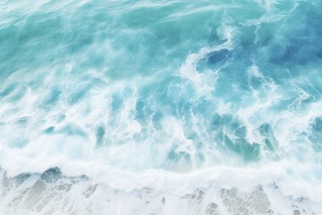 Fototapeta premium Beautiful Abstract Ocean Water Texture Background. Blue Waves Crashing on the Beach with Foamy Foam. Drone Shot of Empty Ocean