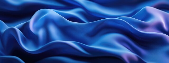 Obraz premium Smooth Blue Silk Fabric Texture with Flowing Drapery and Space for Text or Graphics