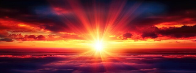 Naklejka premium Vibrant sunset with dark clouds and radiant sun rays creating a picturesque landscape and ample space for text overlay.