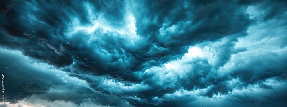 Aufkleber dramatic dark clouds forming over a vivid blue sky creating a striking contrast perfect for adding c