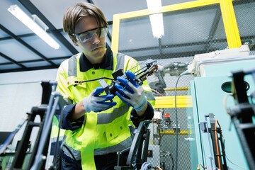 automation machine engineer students study and inspection control robot arm machine in robotics...