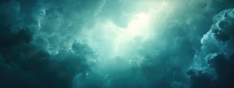 Dramatic stormy sky with lightning illuminating turbulent clouds and ample space for text or design elements