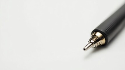 Close-up of 3.5mm Audio Jack on Clean White Background with Ample Space for Text or Graphics