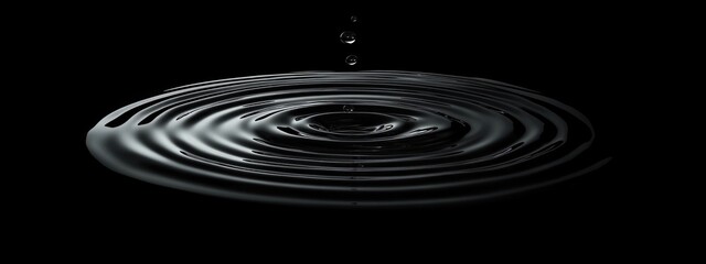 Droplet creating ripples in calm water with dark background ideal for text overlay and design projects