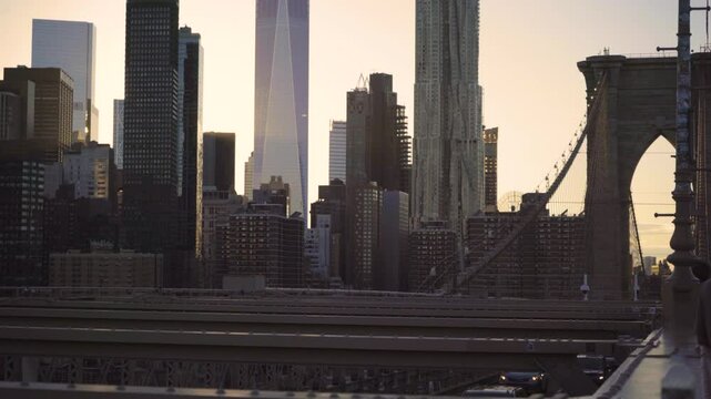 Brooklyn Bridge at Sunset with Manhattan Skyline in New York
