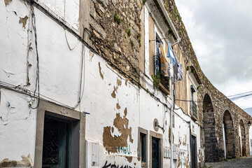 Houses in Evora, Alentejo, Portugal integrated in the ancient Agua da Prata aqueduct.