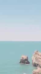 Seascape promontory shoreline outdoors.
