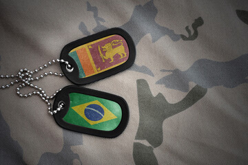 vintage army blank, dog tag with flag of sri lanka and brazil on the khaki texture background....