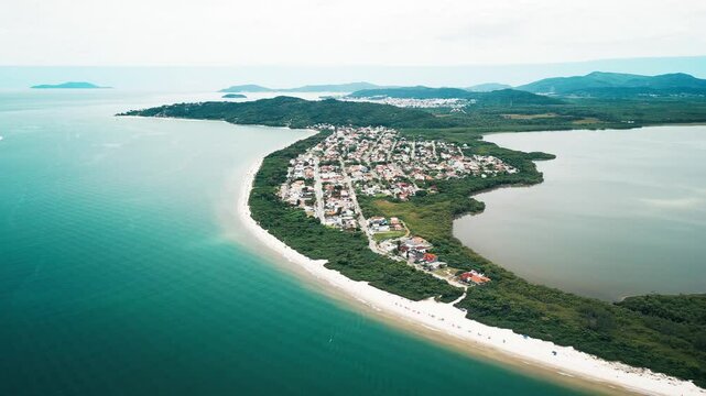 Aerial view of the sandy beach named Daniela located on the north of Santa Catarina island, Florianopolis, Brazil