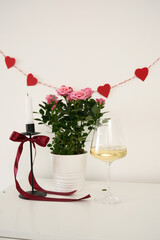 Valentines day table setting red roses and wine glasse, candle on white background. Valentine 's greeting card - Image