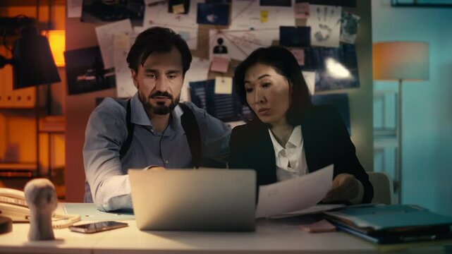 Two police detectives work together on a difficult murder case, analyzing clues