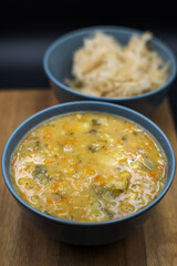 Pea soup, vegetable soup with peas, bacon, and sauerkraut.
