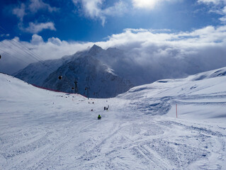 Mountain ski slopes at sunny day