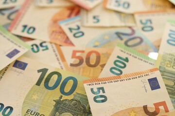 Pile of euro paper banknotes as finance background