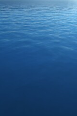 there is a small boat floating in the middle of the water