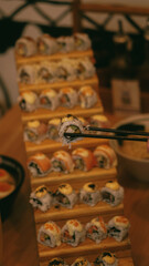 Japanese Sushi Rolls Close-up on Wooden Plate