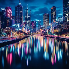 Obraz premium Vibrant City Nightscape With Colorful Lights Reflected on Water
