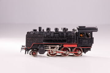 Fototapeta premium View of an old, used, vintage fashion train with white background