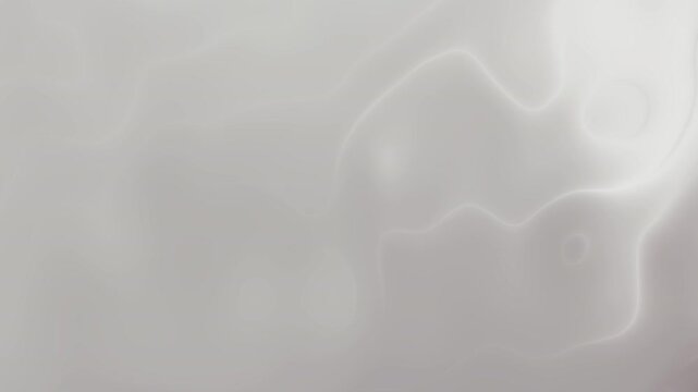 Abstract light gray background with subtle horizontal light streaks and slight variations in tone creating a smooth, calming effect