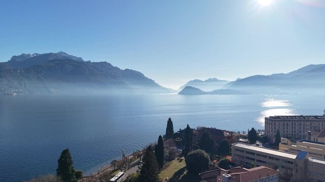Drone flyover above the Italian village of Menaggio in Lake Como Italy